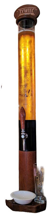 A tall slim beer tower column with a tap, filled with an orange drink