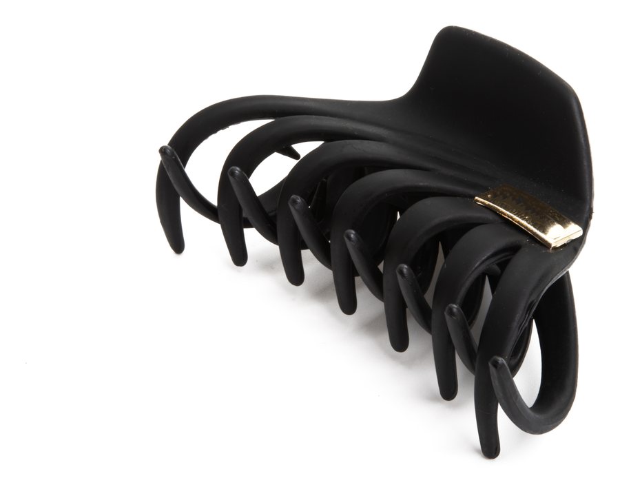 A large matte black claw clip on a white background