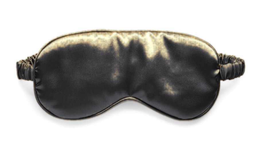 A black satin sleep mask