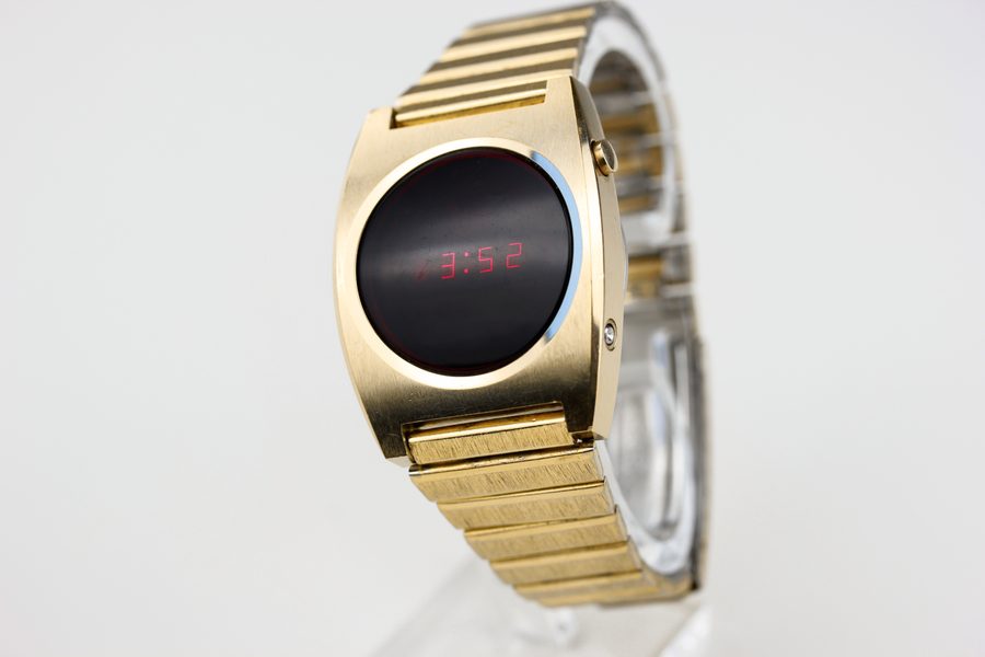 A gold retro digital wristwatch
