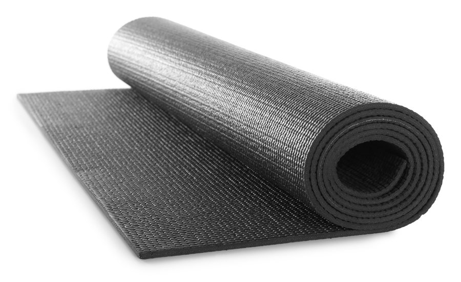 A black rolled yoga mat